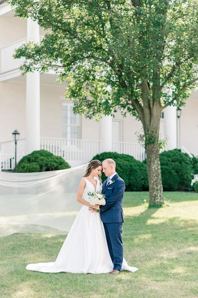 A classic and elegant wedding in Virginia featuring a Stella York wedding dress.