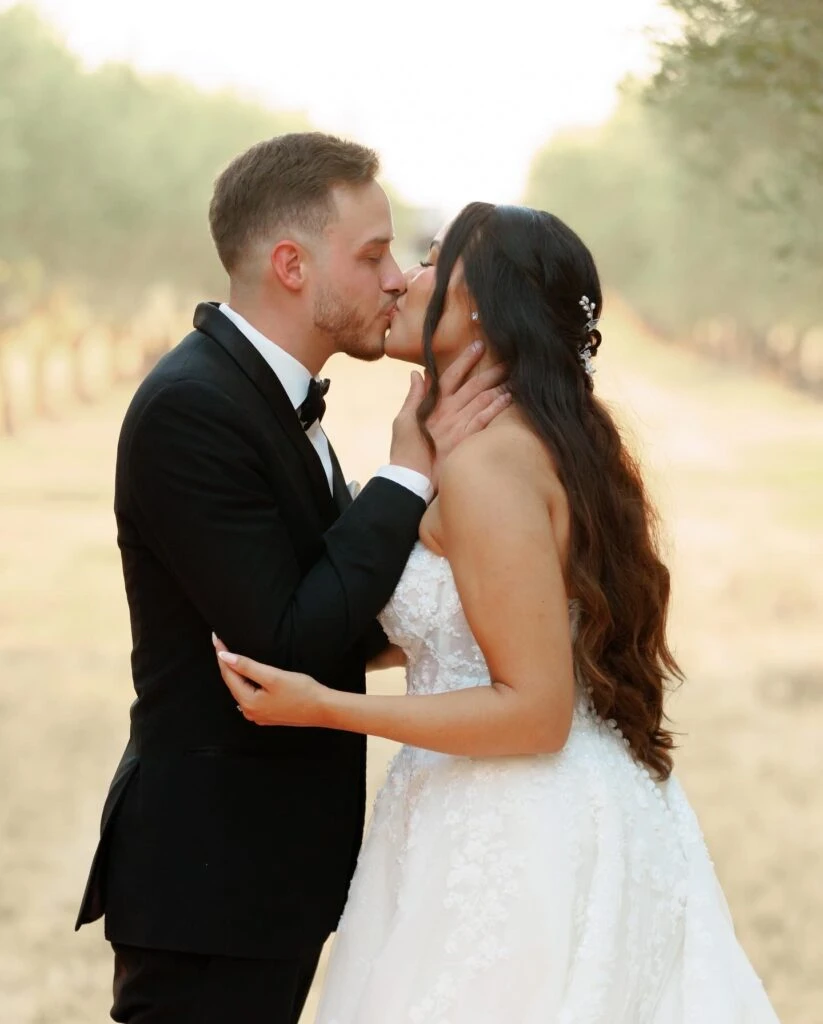real bride mailin embracing husband - Style 1483 by Martina Liana