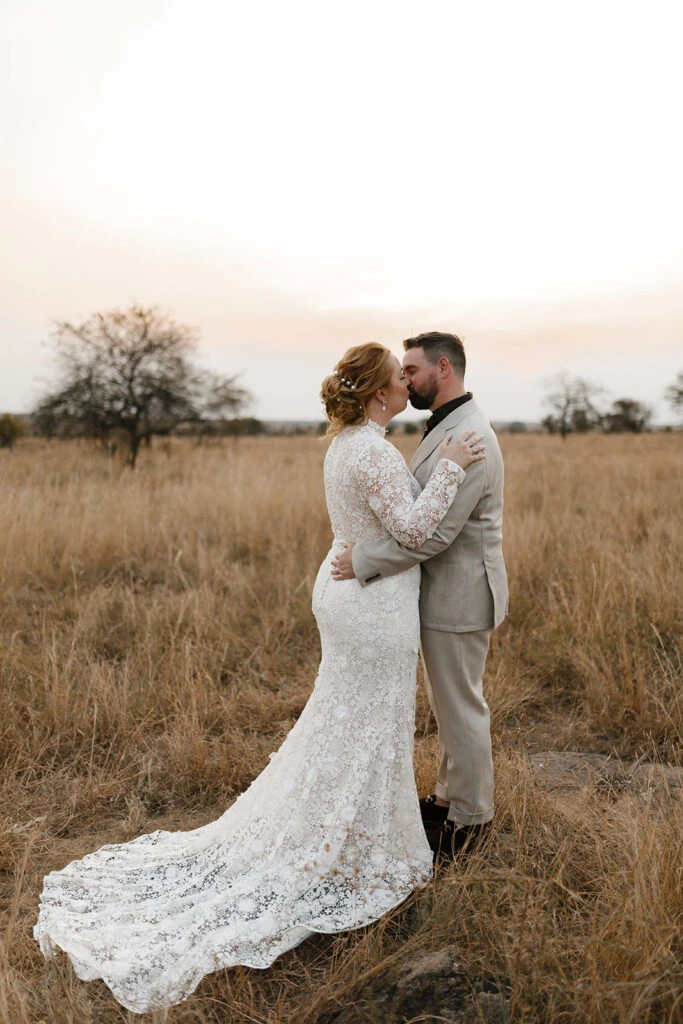 sophie and tom kissing in the serengeti desert - layne by All Who Wander