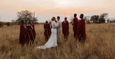 real bride sophie and husband tom eloping in Tanzania wearing layne by All Who Wander