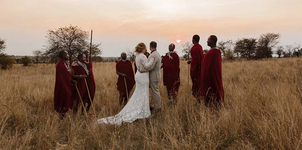 real bride sophie and husband tom eloping in Tanzania wearing layne by All Who Wander
