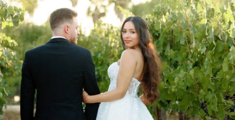 real bride mailin posed with husband in garden - Style 1483 by Martina Liana
