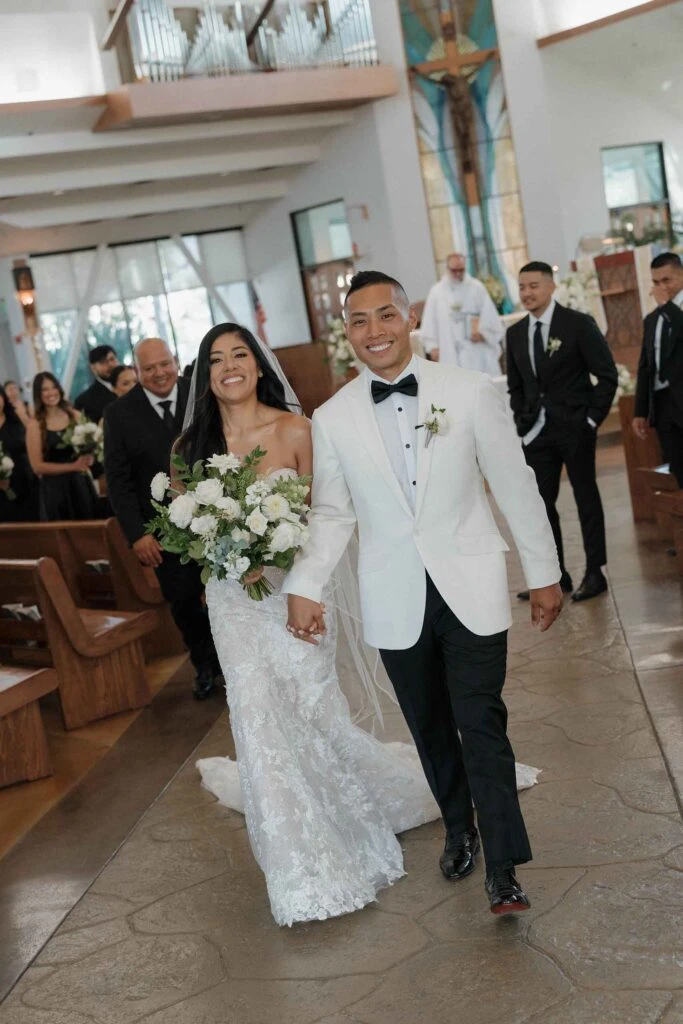 real bride angie and husband walking down the aisle after wedding ceremony - 1367 by Martina Liana