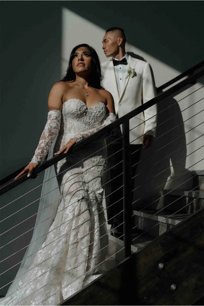 real bride angie and husband posing on stairs - 1367 by Martina Liana