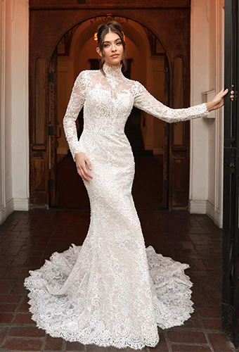 Lace fit and flare wedding dress with long sleeves and high neckline