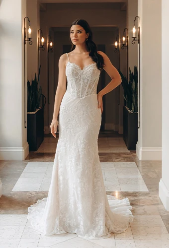 Bride wearing lace wedding dress with corset bodice