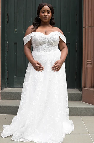 plus size bride wearing off the shoulder a-line wedding dress - 7502+ by Stella York
