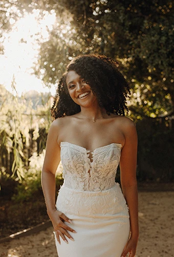bride smiling wearing strapless mermaid wedding dress - 7675 by Stella York