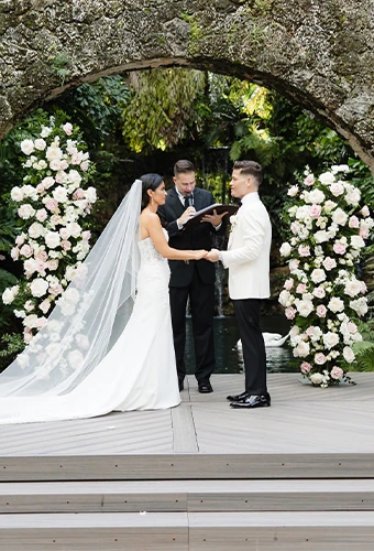 Real bride Jackie exchanging vows with her husband