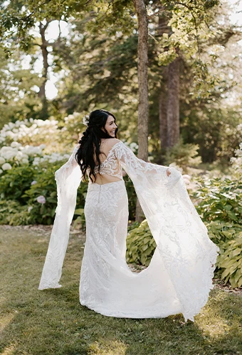 Real bride Hayley twirling in her wedding gown