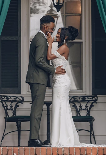 Real bride Daria embracing her husband