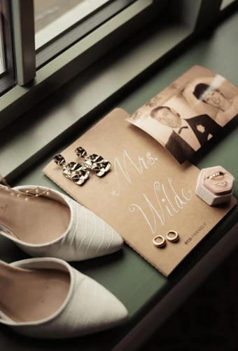 Real bride flat lay of accessories on wedding day