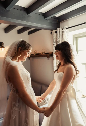 Real brides Fallon and Lily's first look on wedding day