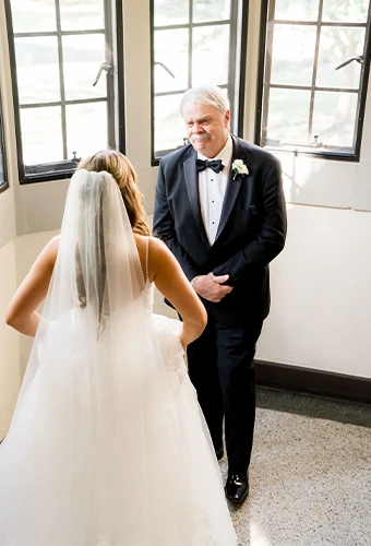 Real bride Janet first look with father on wedding day