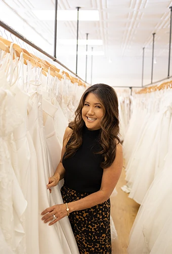 Bridal stylist choosing a gown