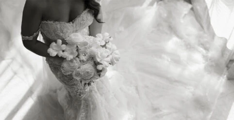 Real bride Christine posing in her wedding gown