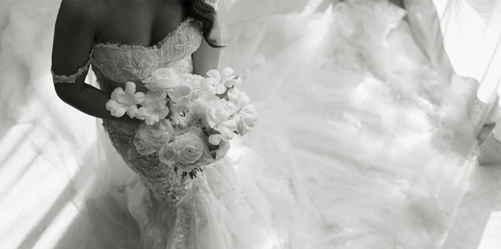 Real bride Christine posing in her wedding gown