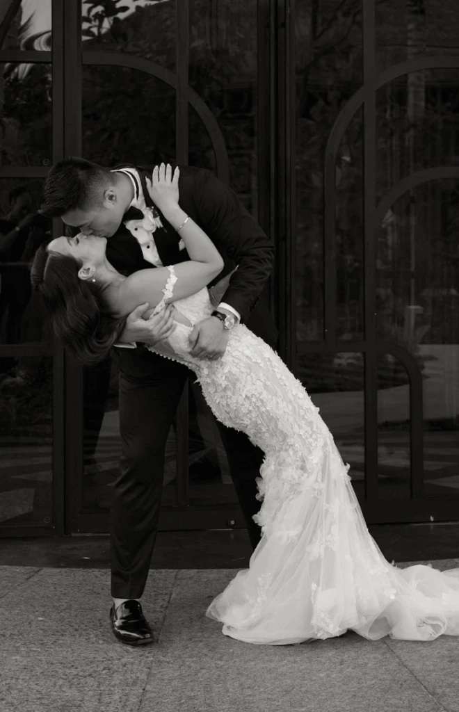 Real bride Christine embracing her husband