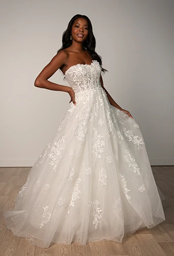 Bride wearing strapless lace a-line wedding dress
