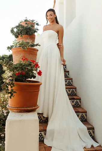 Bride wearing simple strapless wedding dress