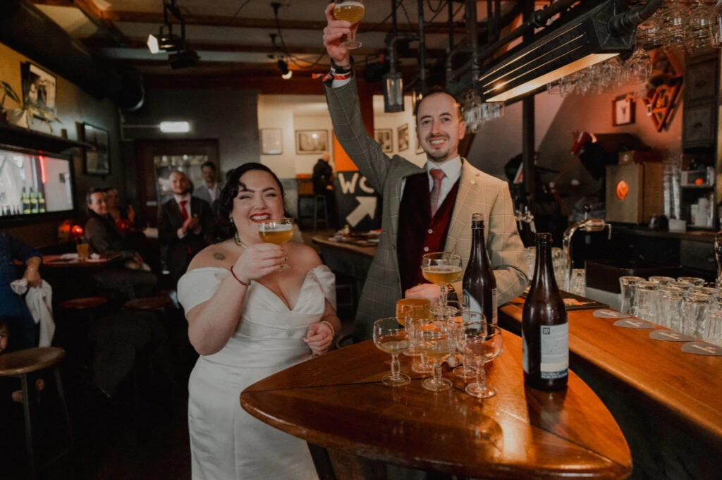 True bride Priscilla cheering with her husband