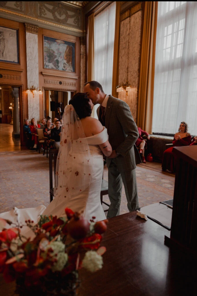 True bride Priscilla embracing her husband