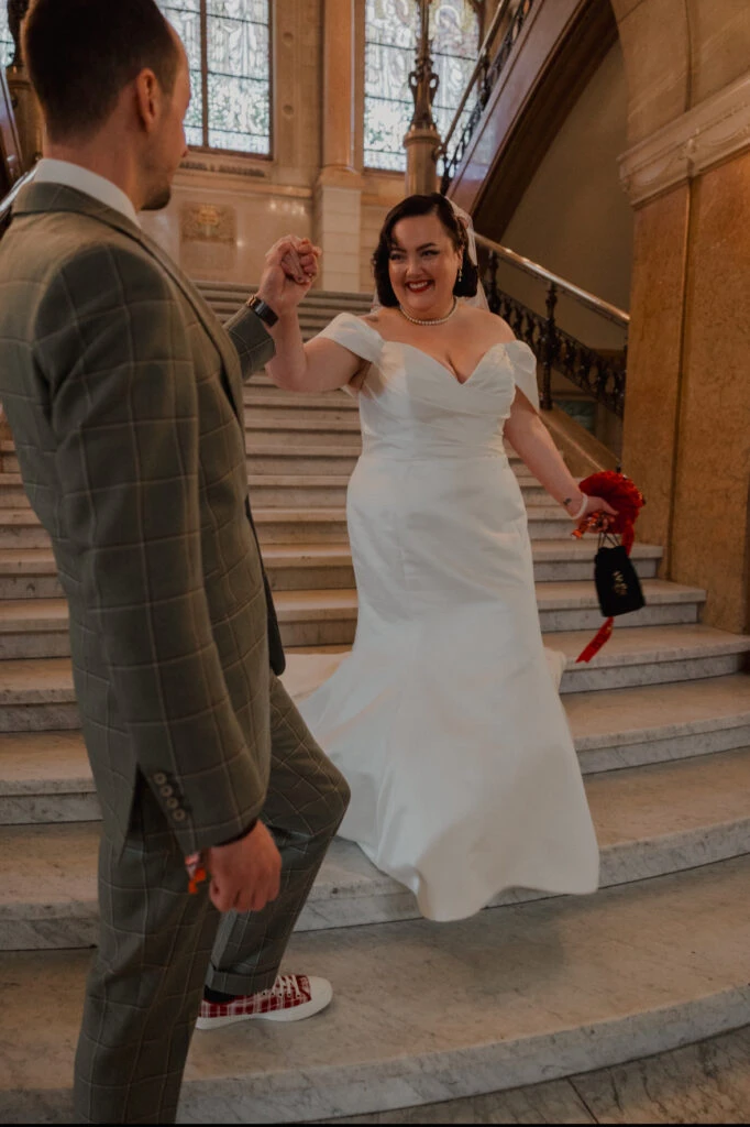 True bride Priscilla posing with her husband