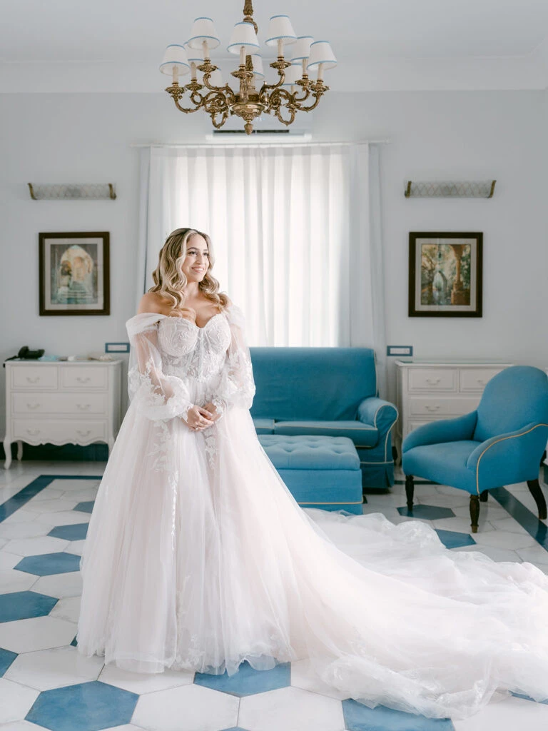 Real bride Emily posing in her wedding gown