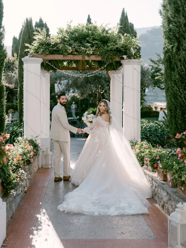 Real bride Emily posing with her husband
