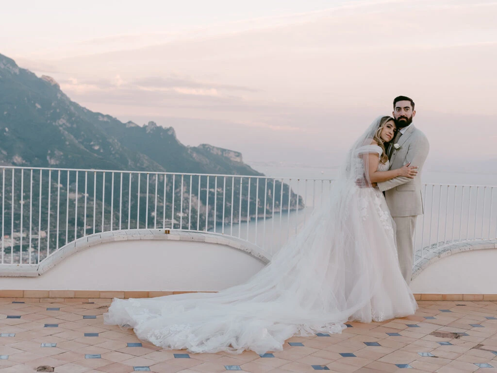 Real bride Emily posing with her husband