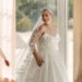 Three brides wearing wedding dresses with different necklines