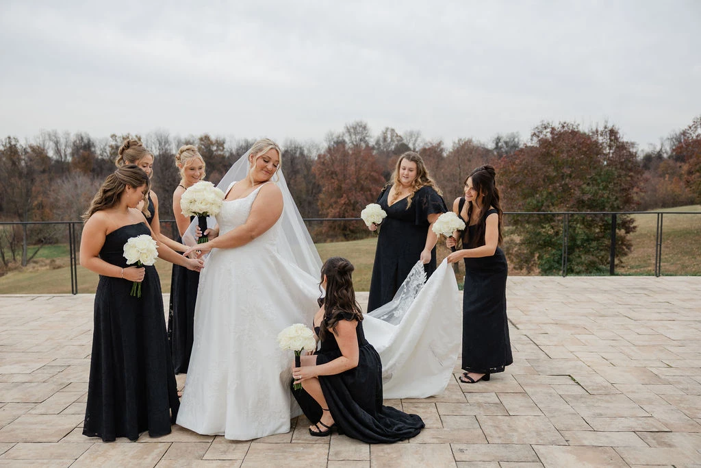 Real bride Alicia posing with her bridal party