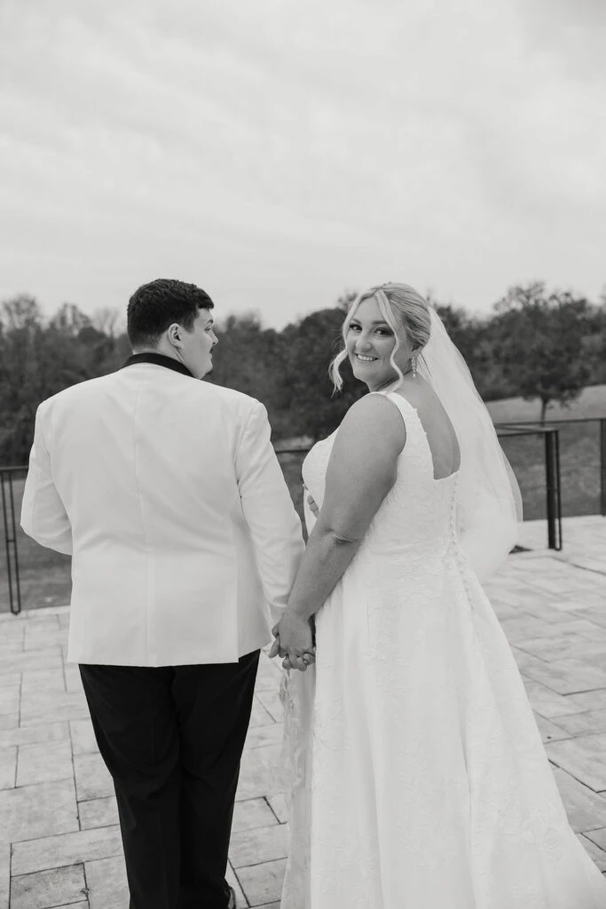 Real bride Alicia posing with her husband