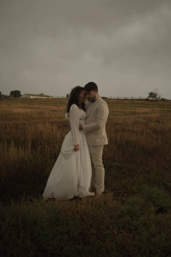 True bride posing with her husband