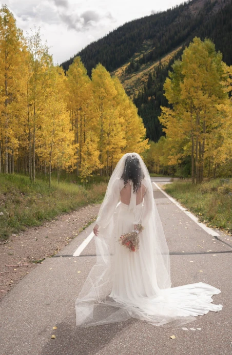 Real bride Hayley posing in her wedding gown