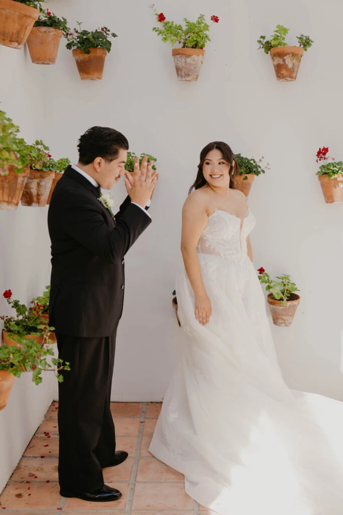 Real bride Maria during her first look with her husband