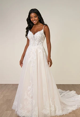 Bride wearing lace a-line wedding dress with beaded details