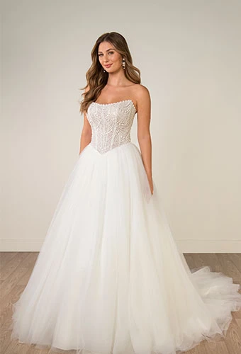 Bride wearing strapless ballgown wedding dress with pearl-beaded corset