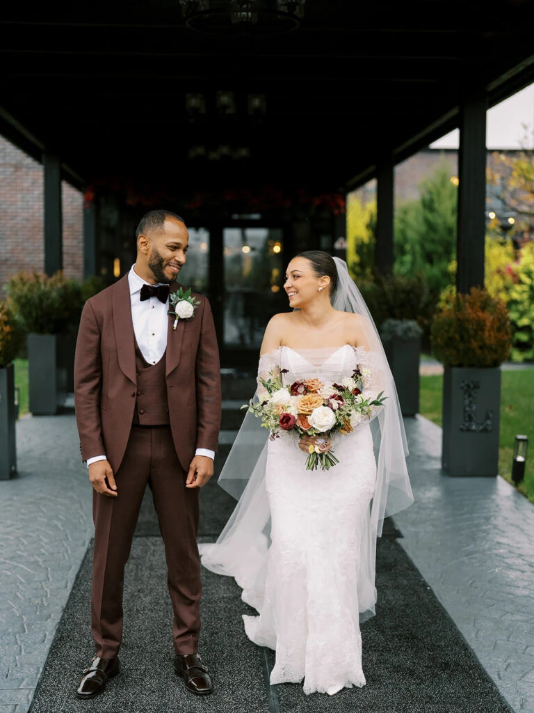 Real bride Alexa posing with her husband
