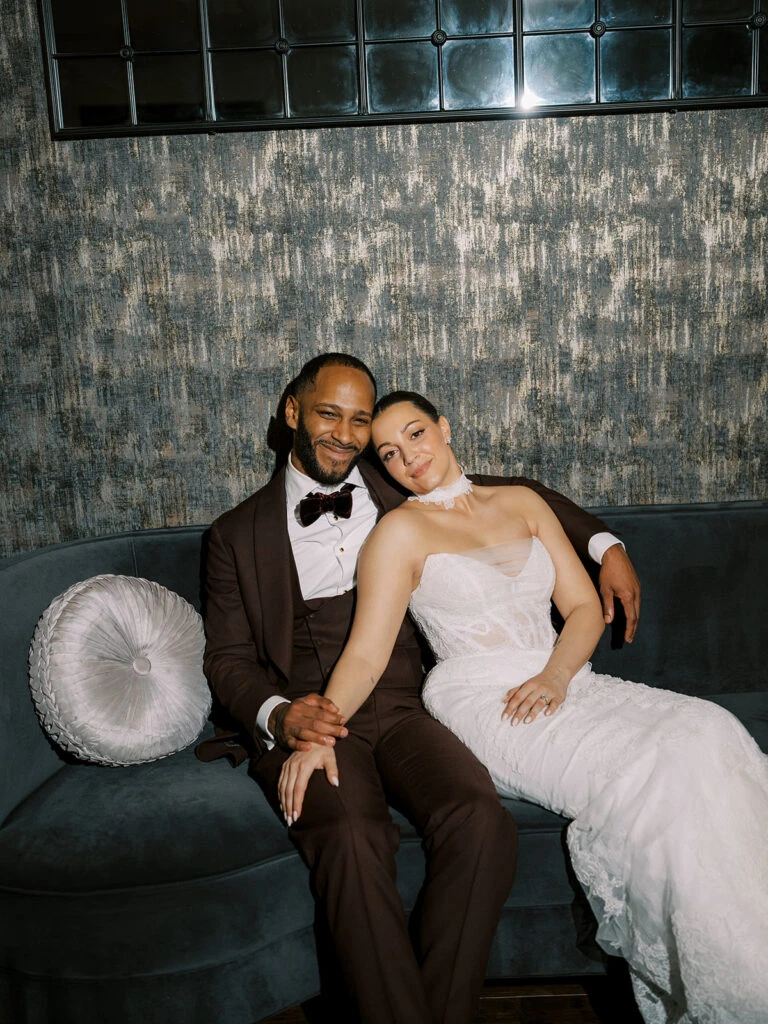 Real bride Alexa posing with her husband