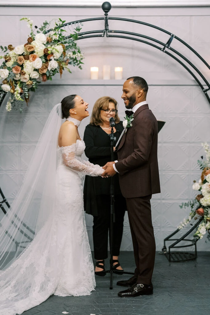 Real bride Alexa at the altar with her husband