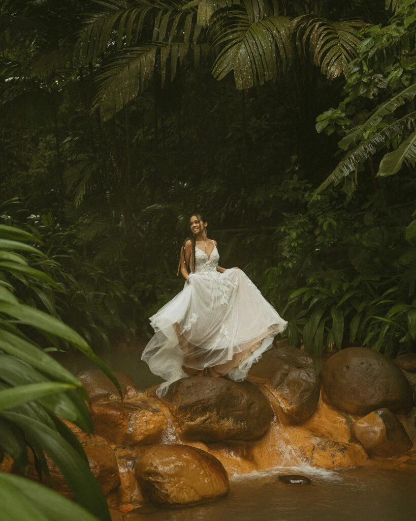 Real bride Daniela posing in her wedding gown