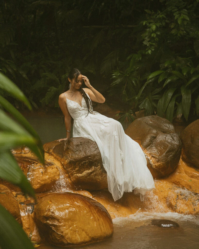 Real bride Daniela posing in her wedding gown