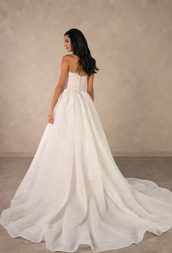 Bride wearing strapless lace ballgown wedding dress