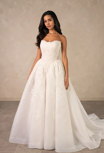 Bride wearing strapless lace ballgown wedding dress