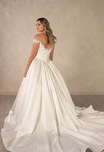 Bride wearing satin ballgown wedding dress with crystal neckline and off-the-shoulder straps