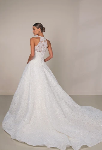 Bride wearing lace wedding dress with halter neckline