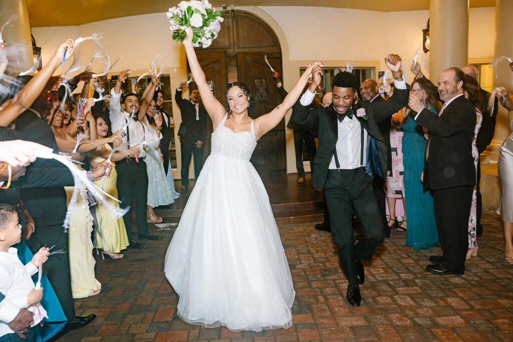 Real Bride Antonia and Pierry celebrating their marriage after the reception