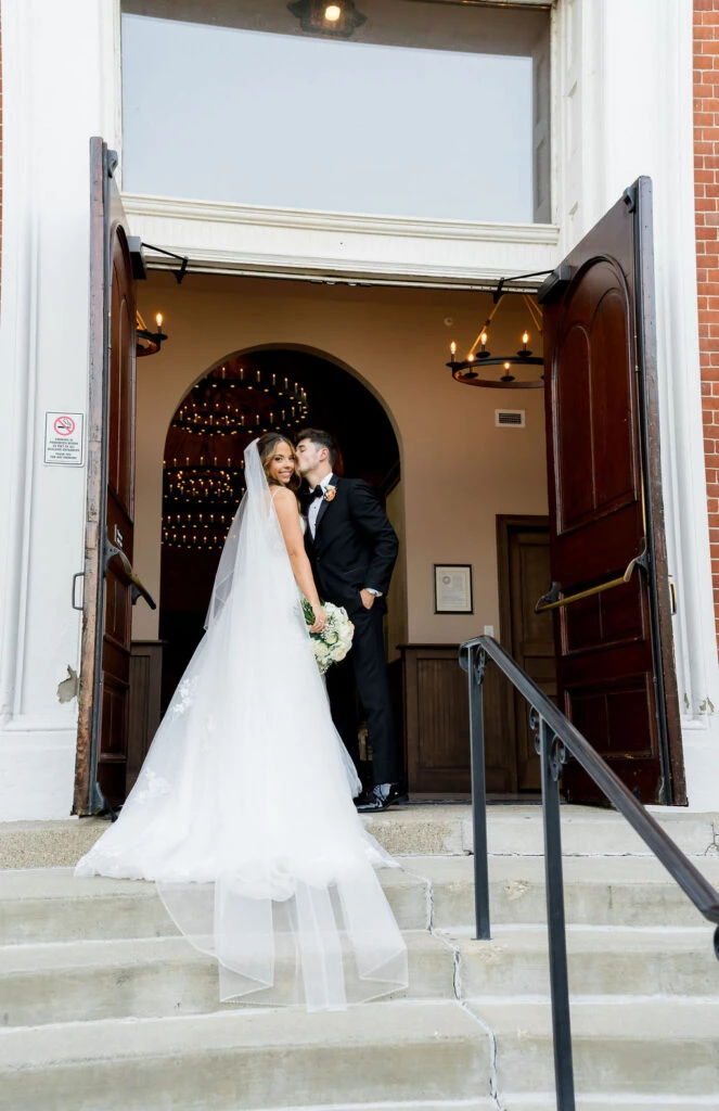 Real bride Janet posing with her husband
