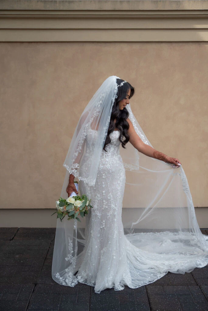 Real Bride Shaban posing in her wedding gown